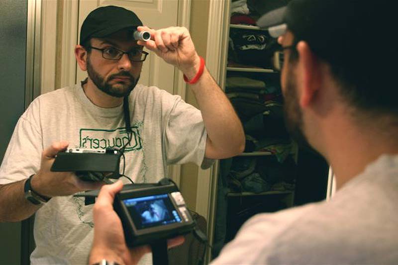 Filmmaker Chris Hansen puts camera mount on his forehead